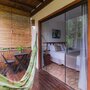 Suíte Duplo Standard – Harmonia e Conforto com Vista para o Jardim