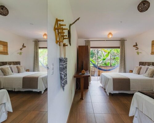 Suíte Duplo com Cama Extra – Espaço, Natureza e Conforto para até 4 Pessoas