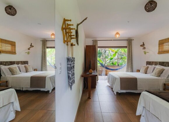 Suíte Duplo com Cama Extra – Espaço, Natureza e Conforto para até 4 Pessoas